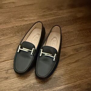 Tod's Elegant Black Leather Loafers with Silver Accent